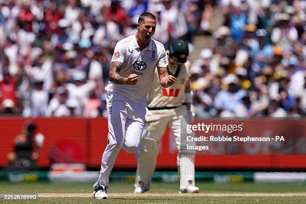England's Brydon Carse celebrates taking the wicket of Australia's Mitchell Starc on day two of the fourth NRMA Insurance Ashes Series 2025 test at...