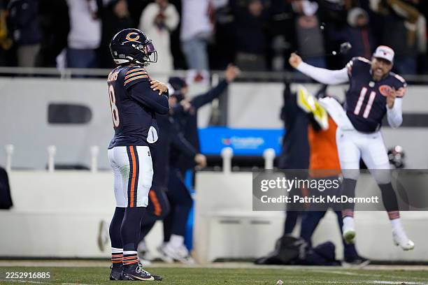 Caleb Williams of the Chicago Bears celebrates after throwing a touchdown pass against the Green Bay Packers during overtime at Soldier Field on...