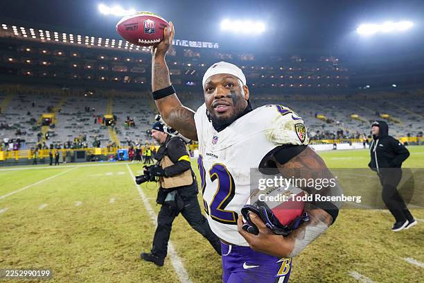 Derrick Henry of the Baltimore Ravens celebrates after an NFL football game against the Green Bay Packers at Lambeau Field on December 27, 2025 in...