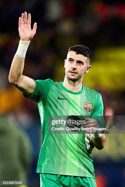 Joan Garcia of FC Barcelona acknowledges the fans after the team's victory following the LaLiga EA Sports match between Villarreal CF and FC...