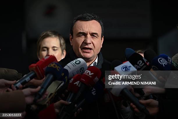 Kosovo's acting Prime Minister and leader of the Vetevendosje Movement Albin Kurti addresses the press after casting his vote at a polling station in...