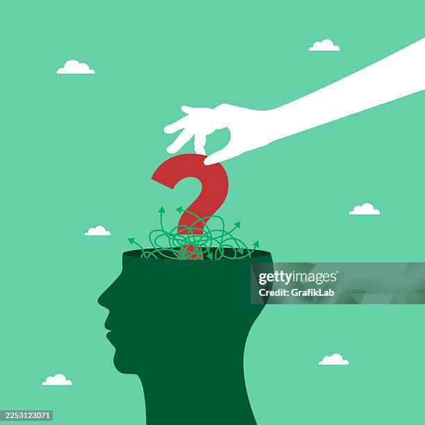 hand placing question mark into tangled mind silhouette and thinking process - question face stock illustrations