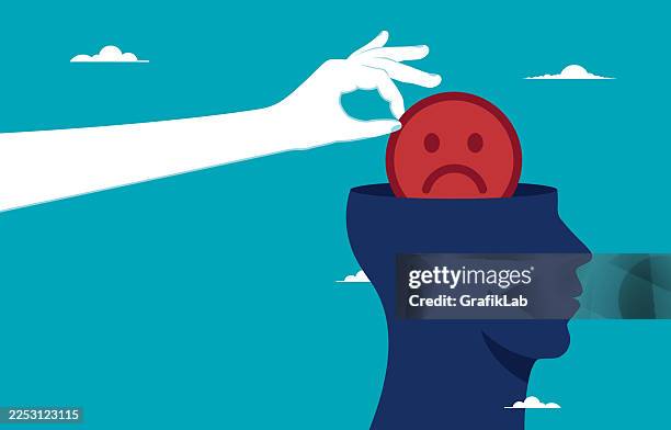hand removing sadness from head symbolizing emotional healing and support - pessimism stock illustrations