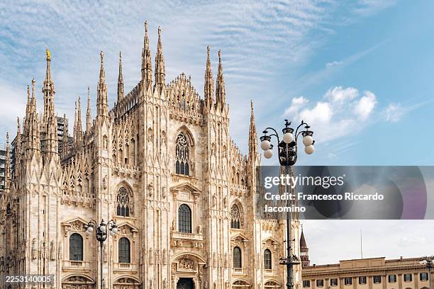 milan duomo an iconic gothic cathedral and landmark in italy. - duomo di milano stock pictures, royalty-free photos & images