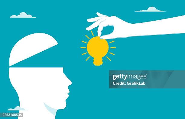 illustration of creativity concept with hand and bright light bulb - rethinking stock illustrations