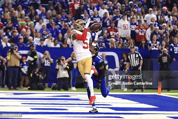 Demarcus Robinson of the San Francisco 49ers catches a pass for a touchdown during the first quarter of the game against the Indianapolis Colts at...