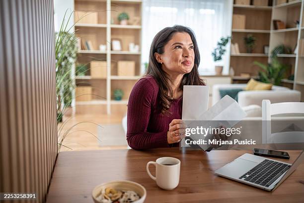 Woman managing finances at home