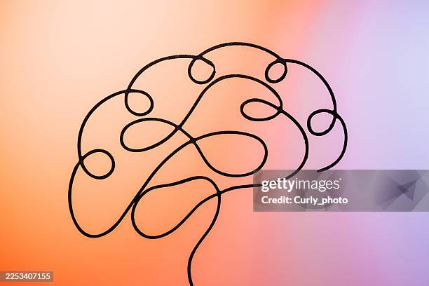 a single continuous black wire loop forms the shape of a human brain against a soft gradient background. - continuous learning stock pictures, royalty-free photos & images