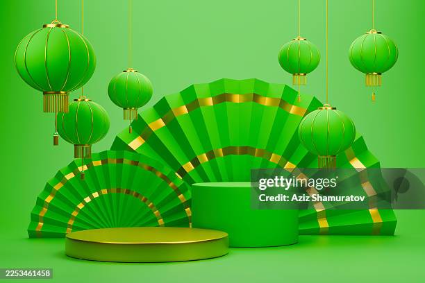Chinese New Year green podium with paper fans and lanterns display.