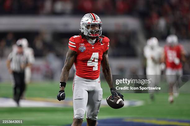 Ohio State Buckeyes wide receiver Jeremiah Smith celebrates a touchdown during the College Football Playoff Quarterfinal at the Goodyear Cotton Bowl...