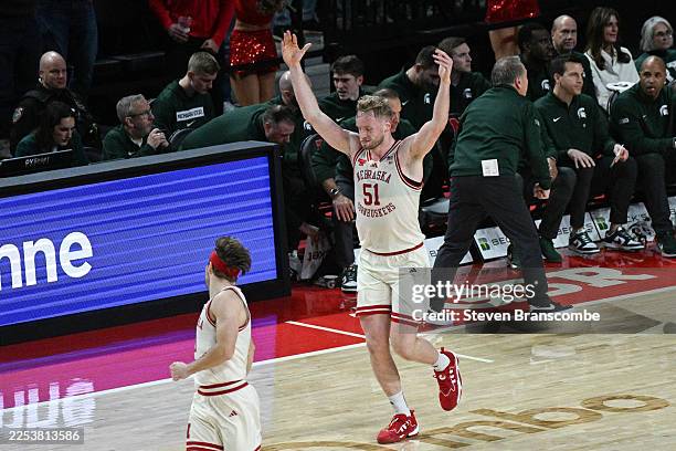Rienk Mast of the Nebraska Cornhuskers celebrates after scoring a three-point basket against the Michigan State Spartans during the first half at...
