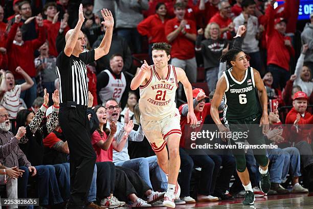 Pryce Sandfort of the Nebraska Cornhuskers reacts after hitting a three point basket against the Michigan State Spartans during the second half at...