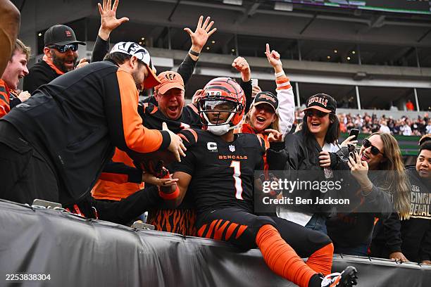 Ja'Marr Chase of the Cincinnati Bengals celebrates with fans after a second quarter touchdown against the Arizona Cardinals at Paycor Stadium on...