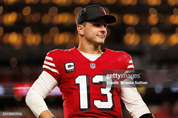 Brock Purdy of the San Francisco 49ers stands on the field after an ...