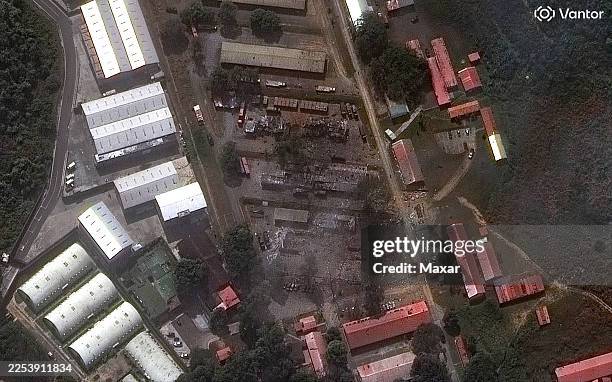 Vantor satellite image shows damage to vehicles and equipment at Fuerte Tiuna military base in Caracas after strikes. Please use: Satellite image...