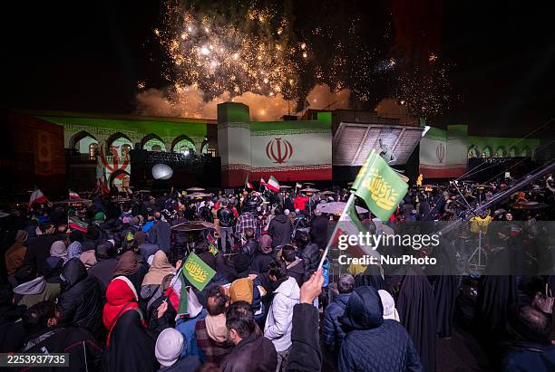 Fireworks light up the sky as people participate in an unveiling ceremony of a statue of the Islamic leader of the Shi'ite Muslims, Imam Ali, the...
