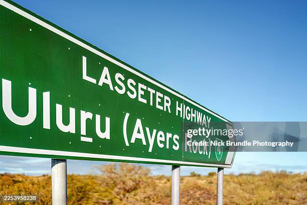 lasseter highway sign - lasseter highway stock pictures, royalty-free photos & images
