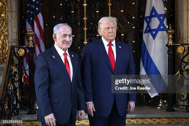 President Donald Trump welcomes Israeli Prime Minister Benjamin Netanyahu to his Mar-a-Lago club on December 29, 2025 in Palm Beach, Florida. The two...