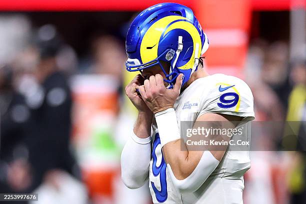 Matthew Stafford of the Los Angeles Rams reacts against the Atlanta Falcons during the fourth quarter at Mercedes-Benz Stadium on December 29, 2025...
