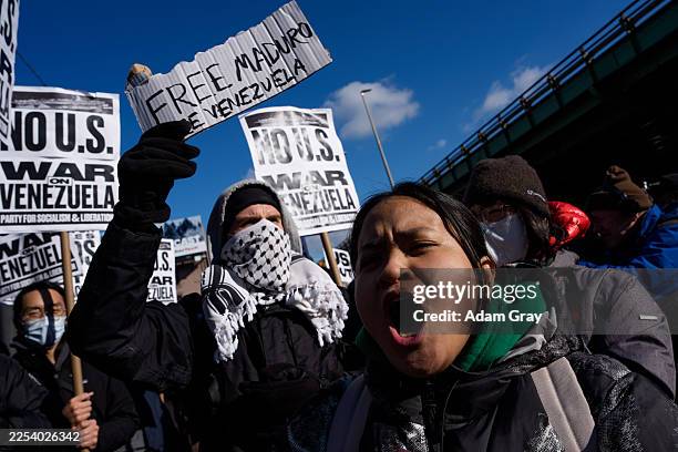 People protest against American intervention in Venezuela and for the release of Venezuelan President Nicolas Maduro outside of the Metropolitan...