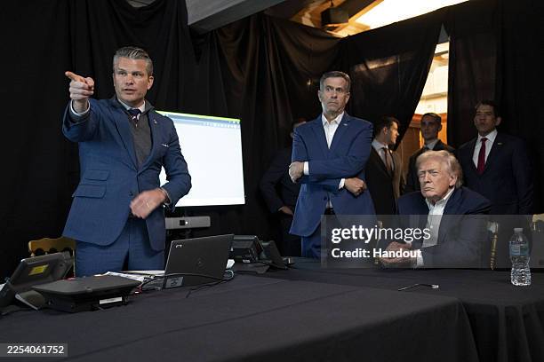 President Donald Trump, Secretary of War Pete Hegseth , and CIA Director John Ratcliffe monitor U.S. Military operations in Venezuela, from Trump's...