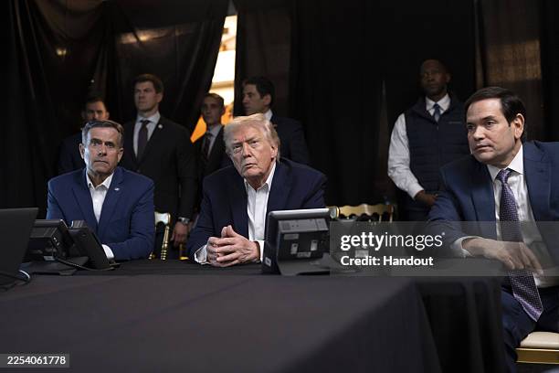 President Donald Trump, CIA Director John Ratcliffe and Secretary of State Marco Rubio monitor U.S. Military operations in Venezuela, from Trump's...