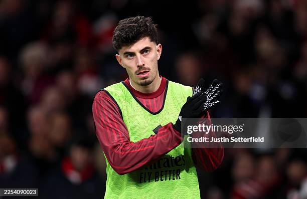 Kai Havertz of Arsenal applauds as he warms up on the side lines during the Premier League match between Arsenal and Aston Villa at Emirates Stadium...