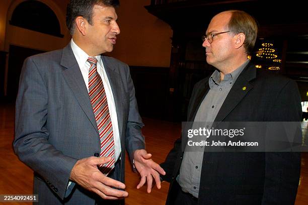 Presidential candidates Michael Badnarik and David Cobb talk before a debate at the University of Texas, Austin, Texas, October 7, 2004.