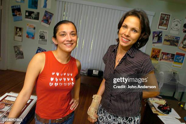 Portrait of Propaganda Media publicists Lori Lopez and Vickie Lucero, Austin, Texas, October 5, 2004.