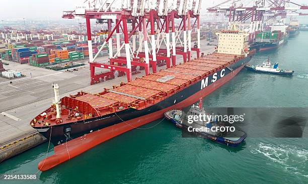 The first ship of the new direct route from Australia slowly berthed at Qingdao Port in Qingdao, Shandong Province, China on January 4, 2026.