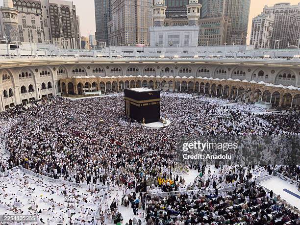 Muslim worshippers perform prayers around the Kaaba inside Masjid al-Haram in Mecca, Saudi Arabia, on January 4, 2026. Considered the holiest site in...