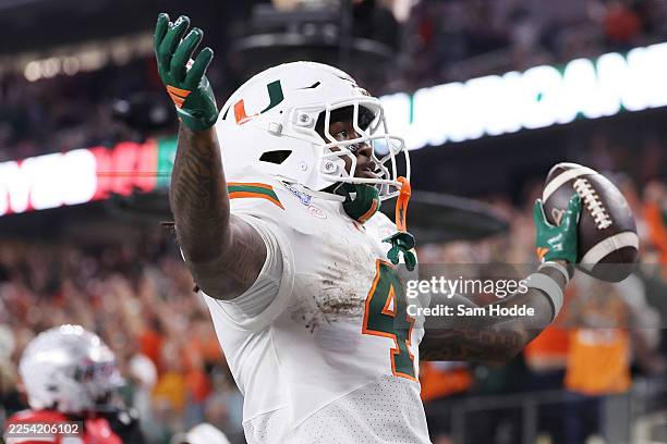 Mark Fletcher Jr. #4 of the Miami Hurricanes scores a second quarter touchdown against the Ohio State Buckeyes during the 2025 College Football...