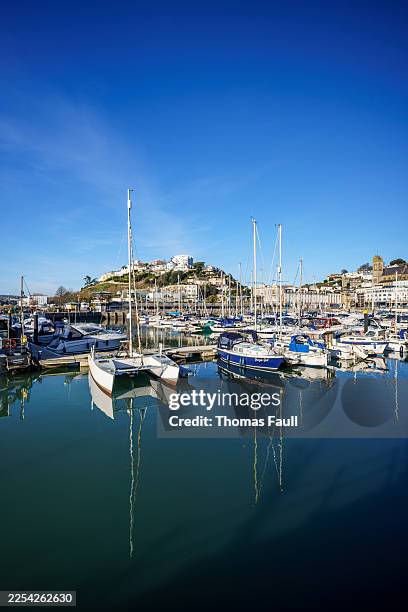 boats in torquay inner harbour - south west england stock pictures, royalty-free photos & images