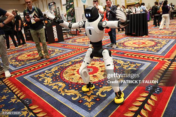 The Agibot X2 humanoid robot dances as it is demonstrated during Pepcom ahead of the annual Consumer Electronics Show in Las Vegas, Nevada on January...