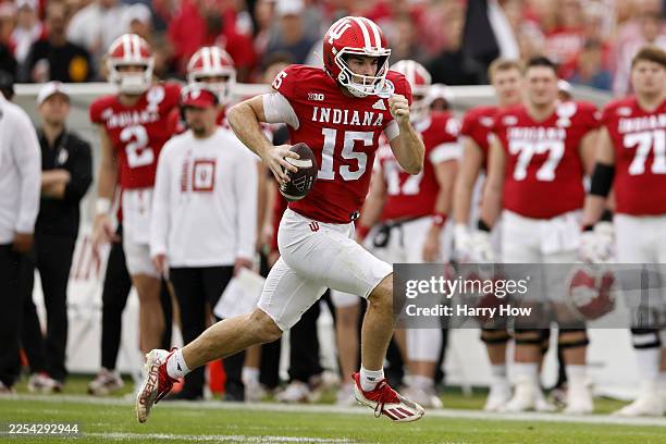 Fernando Mendoza of the Indiana Hoosiers runs with the ball in the second quarter against the Alabama Crimson Tide in the College Football Playoff...