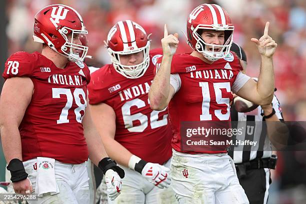 Fernando Mendoza of the Indiana Hoosiers reacts after running for a first down in the third quarter against the Alabama Crimson Tide in the College...