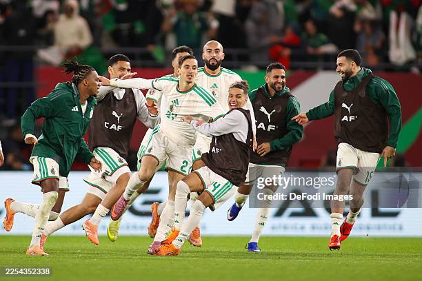 Rabat, Morocco Algeria's Adil Boulbina celebrates his goal with team mates during the Africa Cup Of Nations Round Of 16 match between Algeria and DR...