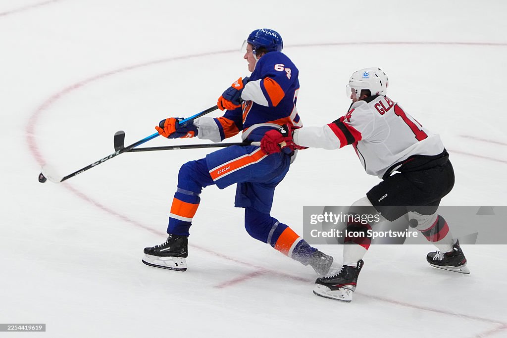 Calumn Ritchie New York Islanders Center Calum Ritchie takes a shot on goal and ...