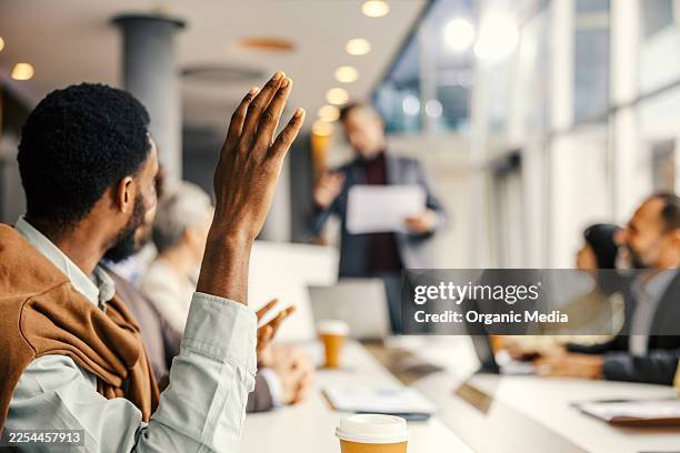 group of business people participating in office meeting - ask stock pictures, royalty-free photos & images