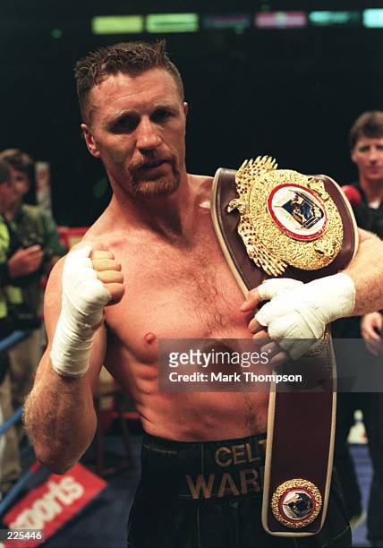 Steve Collins of Ireland keeps his WBO super middleweight belt after beating Nigel Benn at the Nynex Arena in Manchester. The fight was stopped after...