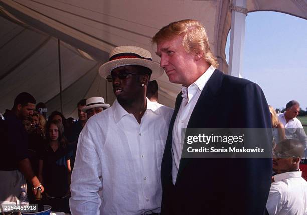 Sean "Diddy" Combs and Donald Trump attend the 1998 Mercedes Benz Polo Challenge at the Bridgehampton Polo Club in Bridgehampton, New York on August...