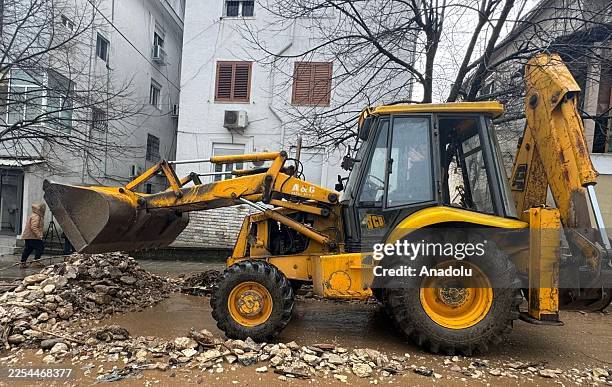 Heavy construction equipment cleans the streets as heavy rainfall caused flooding in Durres, Lezhe, Gjirokaster and Shkoder, Albania on January 7,...