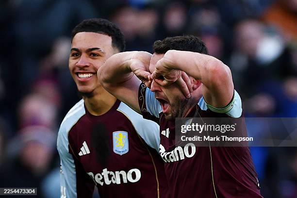 John McGinn of Aston Villa celebrates scoring his team's third goal during the Premier League match between Aston Villa and Nottingham Forest at...