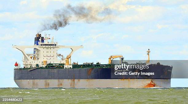 View of the Overseas Mulan tanker ship at sea just outside the port of Rotterdam on August 24, 2014 in Rotterdam, Netherlands. In 2026, the tanker...