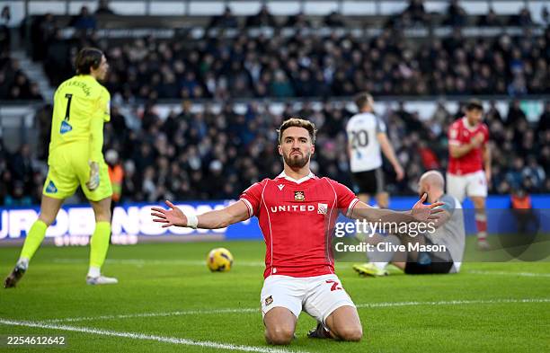Sam Smith of Wrexham celebrates scoring his team's first goal during the Sky Bet Championship match between Derby County and Wrexham AFC at Pride...
