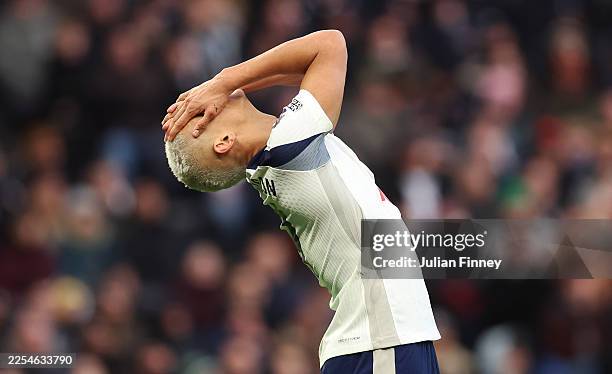 Richarlison of Tottenham Hotspur holds his hands in his head after a missed chance during the Premier League match between Tottenham Hotspur and...