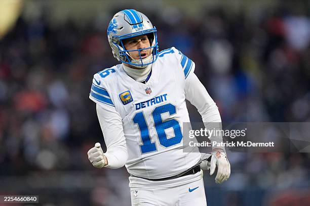 Jared Goff of the Detroit Lions celebrates after a touchdown pass in the second quarter against the Chicago Bears at Soldier Field on January 04,...
