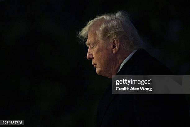 President Donald Trump walks on the South Lawn after landing at the White House on January 4 in Washington, D.C. President Trump returned to...