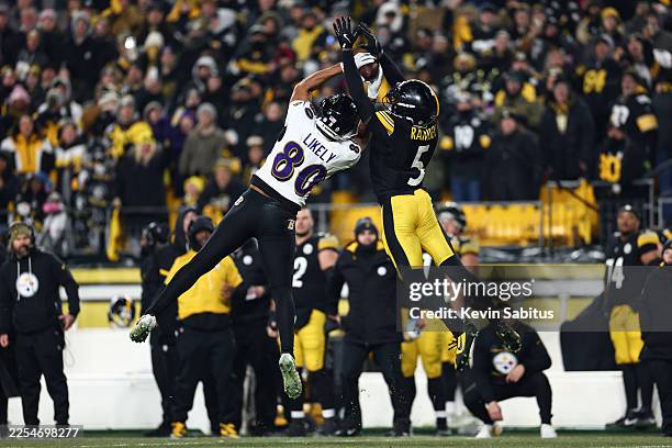 Isaiah Likely of the Baltimore Ravens catches a pass during the fourth quarter against the Pittsburgh Steelers at Acrisure Stadium on January 4, 2026...