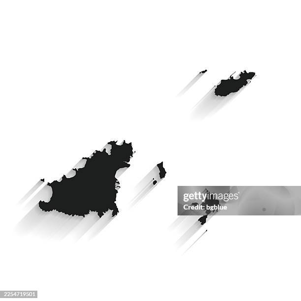 black bailiwick of guernsey map with long shadow on white background - flat design - guernsey stock illustrations